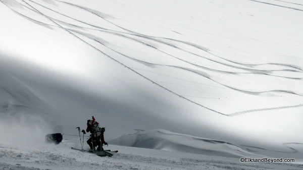 Tyler's sled just about whipping an onlooking Caleb.