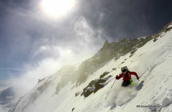 Tyler feeling right at home with some powder over solid glacial blue ice.