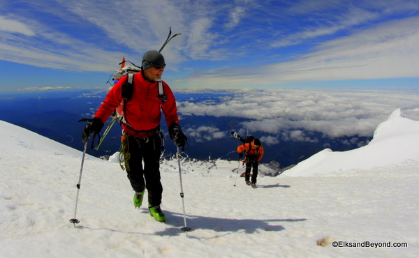 Lou Dawson on the summit with Caleb in tow.