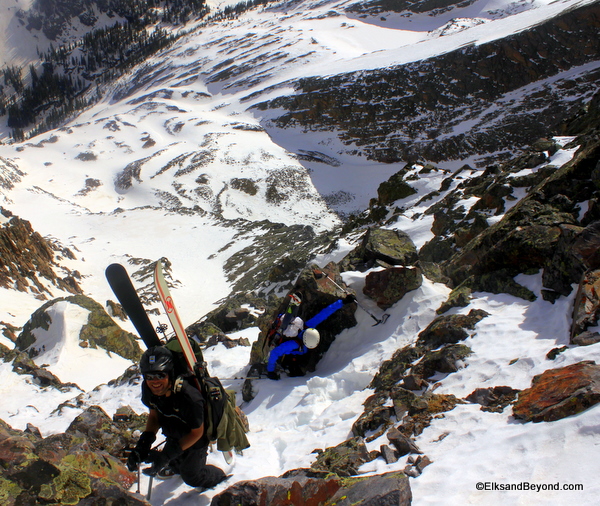 Ben and Nick pick their way through the gnar at the top.