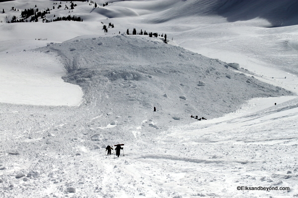 Thats a big avalanche.  I've been seeing quite a few of these lately.  Seems nearly all of them have been caused by cornice breakage.  The Cornice that broke here was the size of a freight train.  8-15 ft overhanging, 25 feet deep and about 300 feet long.  My money says that would send just about any slope.