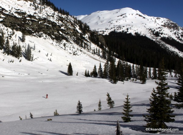 IMG_9725 Breaking through treeline in the lower basin. These corn turns would prove to be perfect later.