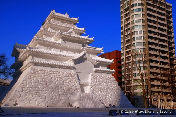 That is a 3 story ice/snow sculpture, part of the ice festival.