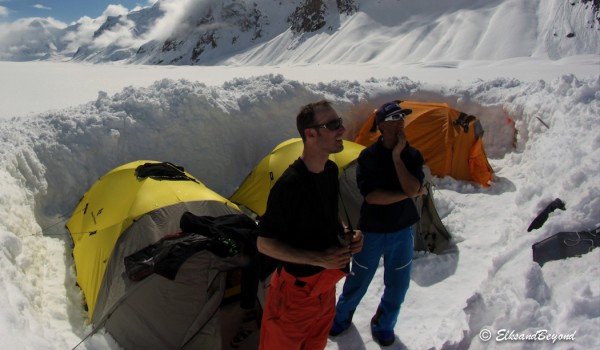 Sun Tanning and watching snow sliding.