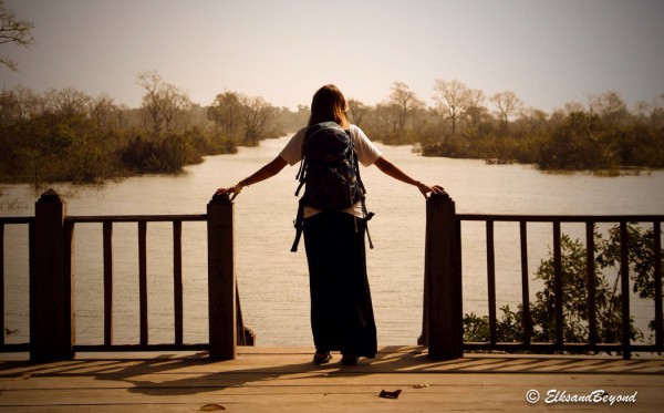 Elisabeth checking out the edge of Neak Pean. 