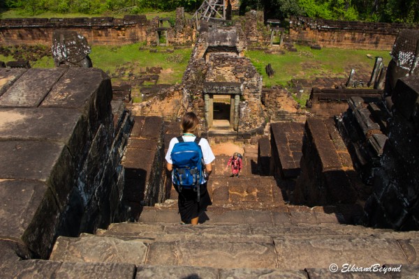 The stairs on all of these temples are all incredibly steep.  Elisabeth dropping down off of the top of Pre Rup.