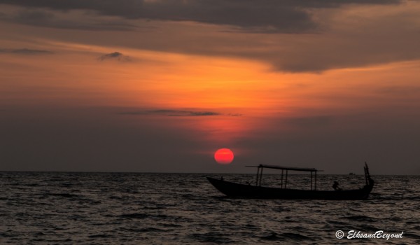 A late day fisherman cruising by.