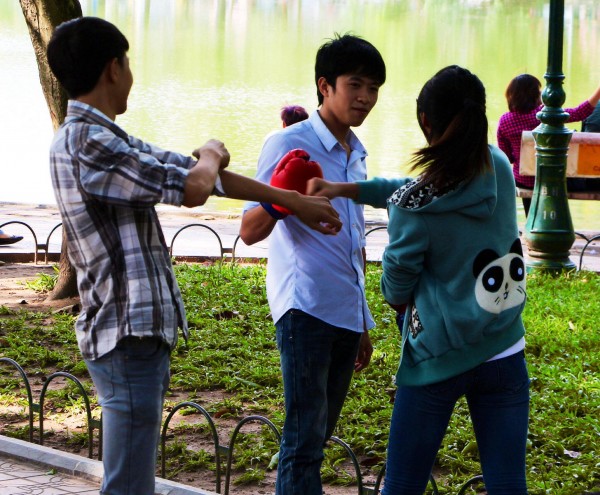 Boxing practice next to the Hoan Kiem Lake.