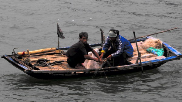 Fisherman bringing in the days catch.