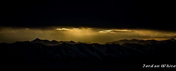 Eery light and clouds from the northeast ridge on the climb up.