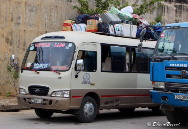 Our van waiting at the Vietnam border.  It only got more crowded.