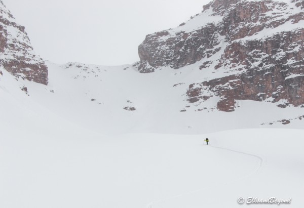 Evan putting in the track to the top of our second descent.  It's still deep and snowing, if only it would clear a little bit.